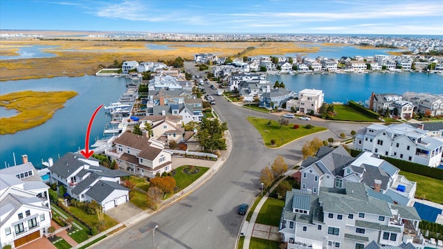 drone / aerial view featuring a water view