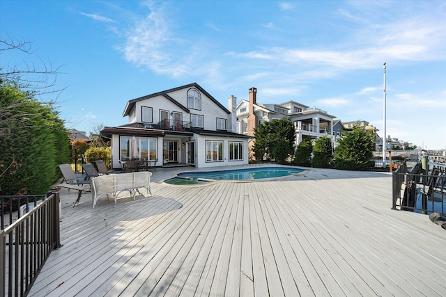 view of pool with a deck