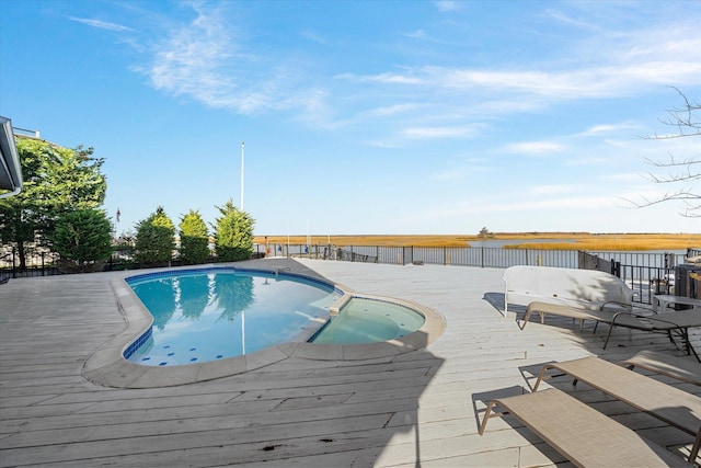 view of pool featuring a wooden deck