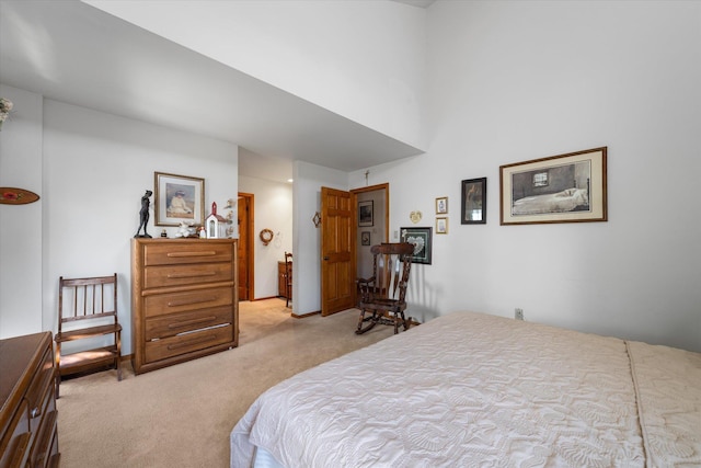 bedroom with light colored carpet