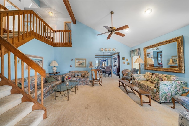 carpeted living room featuring ceiling fan, beamed ceiling, and high vaulted ceiling