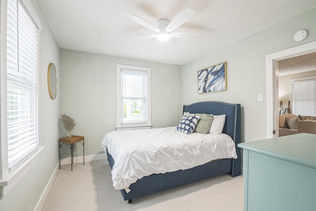 6110 Seaview Ave, Wildwood Crest, NJ 08260 - bedroom with light carpet and a ceiling fan