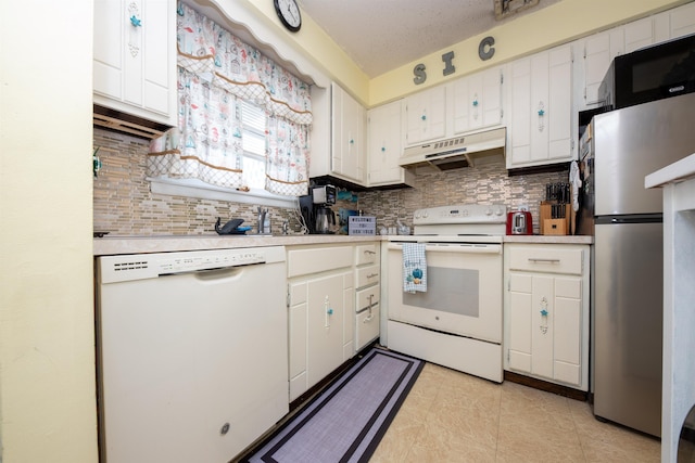 kitchen featuring decorative backsplash, white appliances, light countertops, and under cabinet range hood