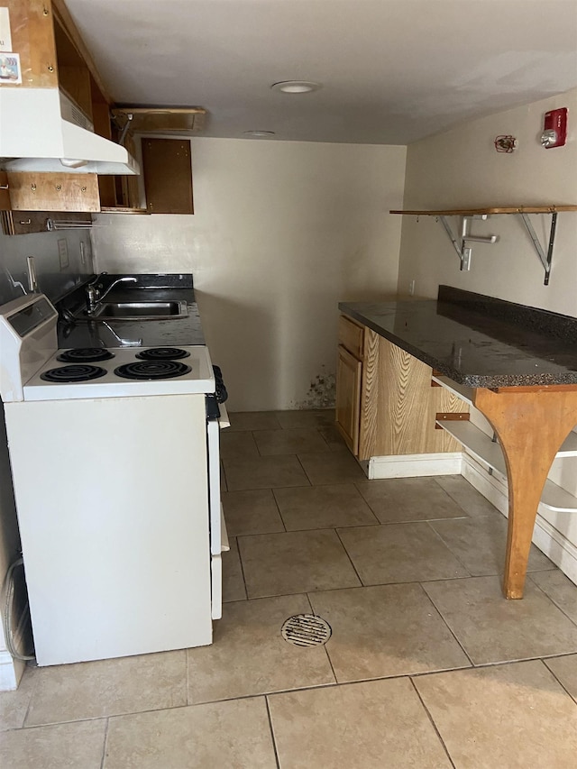 kitchen with under cabinet range hood, light tile patterned floors, a sink, and white range with electric cooktop