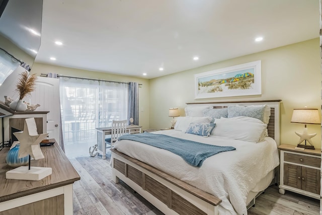405 Ocean Ave Unit 110, North Wildwood, NJ 08260 - bedroom featuring light wood-type flooring, recessed lighting, and access to outside