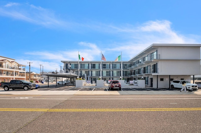 405 Ocean Ave Unit 110, North Wildwood, NJ 08260 - view of building exterior featuring covered parking