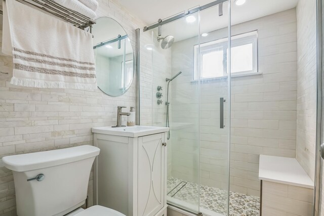 405 Ocean Ave Unit 110, North Wildwood, NJ 08260 - full bathroom with vanity, a shower stall, and tile walls