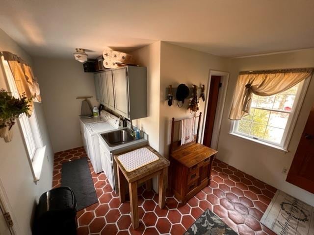 interior space featuring washing machine and dryer and sink