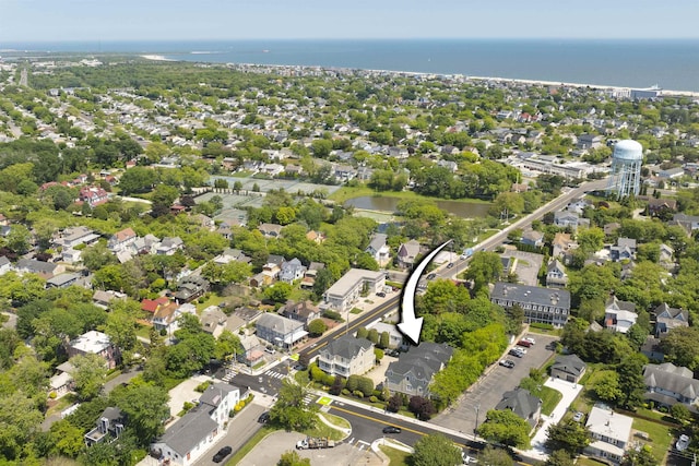 aerial view with a water view and a residential view