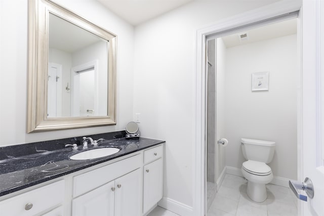 full bathroom featuring tile patterned flooring, visible vents, baseboards, toilet, and vanity