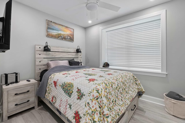 bedroom with light wood-style floors, recessed lighting, baseboards, and a ceiling fan