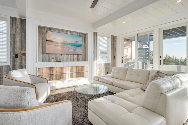 101 Harvard Ave, Cape May Point, NJ 08212 - living room featuring beamed ceiling, plenty of natural light, wooden walls, and wood finished floors