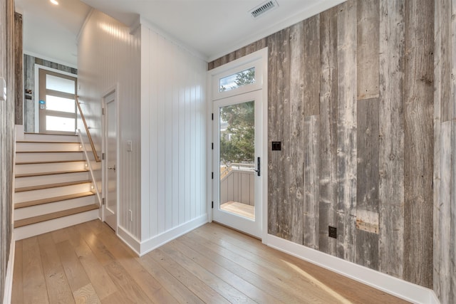 101 Harvard Ave, Cape May Point, NJ 08212 - entryway featuring visible vents, a healthy amount of sunlight, stairs, and hardwood / wood-style flooring