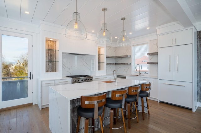 101 Harvard Ave, Cape May Point, NJ 08212 - kitchen with open shelves, tasteful backsplash, wood finished floors, and white cabinetry
