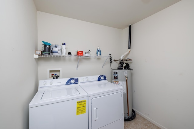 324 E 23rd Ave Unit A, North Wildwood, NJ 08260 - laundry room with water heater, washing machine and clothes dryer, and light tile patterned floors