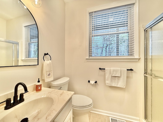 full bath featuring visible vents, toilet, an enclosed shower, vanity, and tile patterned floors