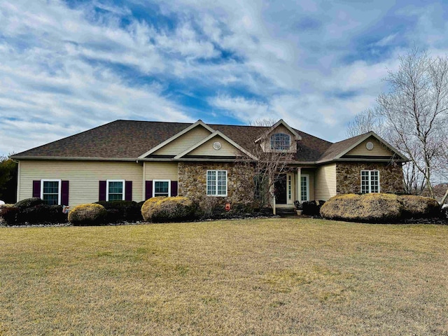 view of front of property with a front lawn