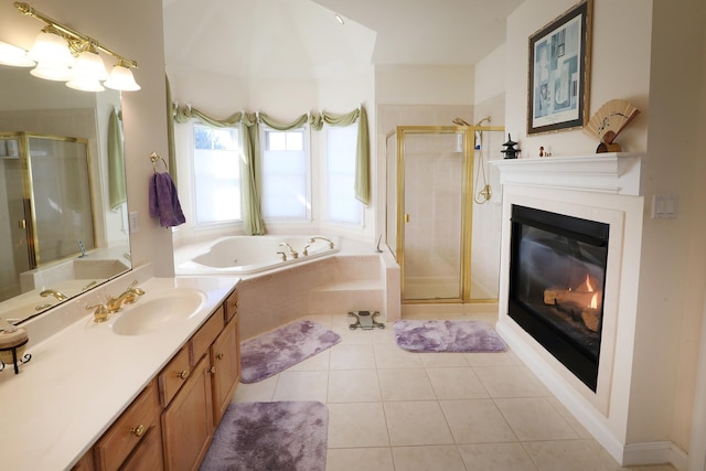 bathroom featuring vanity, separate shower and tub, and tile patterned flooring