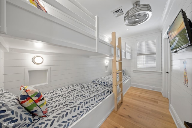 bedroom featuring visible vents and light wood-type flooring