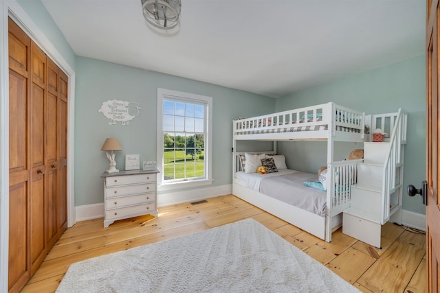 892 Weeks Landing Rd, Erma, NJ 08204 - bedroom with hardwood / wood-style floors, baseboards, and a closet