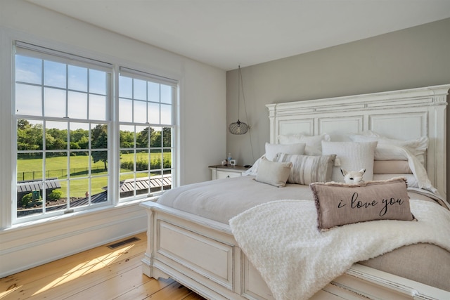 892 Weeks Landing Rd, Erma, NJ 08204 - bedroom featuring multiple windows and light wood-style floors