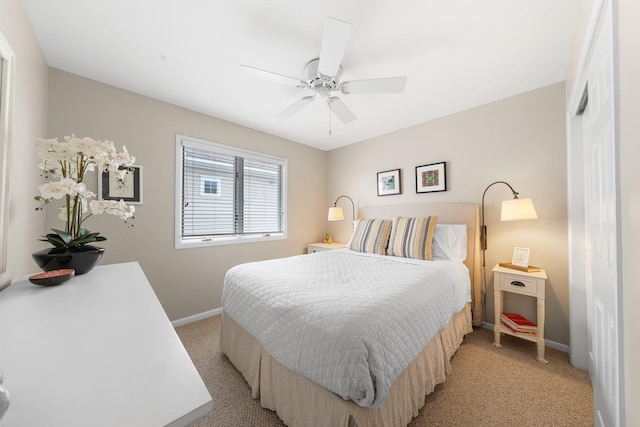 255 117th St Unit 2, Stone Harbor, NJ 08247 - bedroom featuring light carpet, baseboards, and a ceiling fan