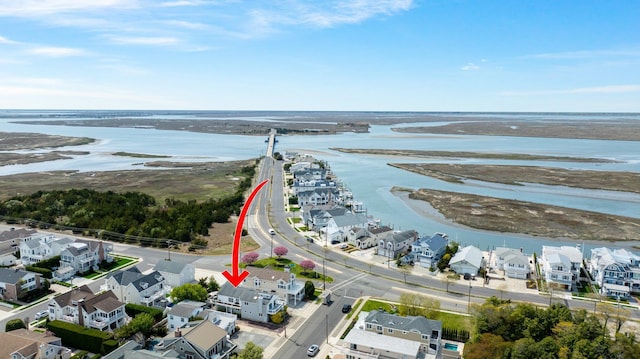 255 117th St Unit 2, Stone Harbor, NJ 08247 - birds eye view of property featuring a water view and a residential view