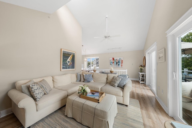 255 117th St Unit 2, Stone Harbor, NJ 08247 - living area featuring ceiling fan, baseboards, high vaulted ceiling, and light wood-style floors