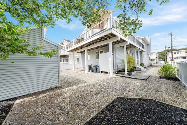 255 117th St Unit 2, Stone Harbor, NJ 08247 - back of property with a wooden deck and fence