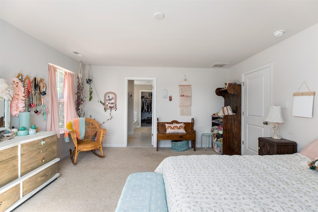 bedroom with light colored carpet