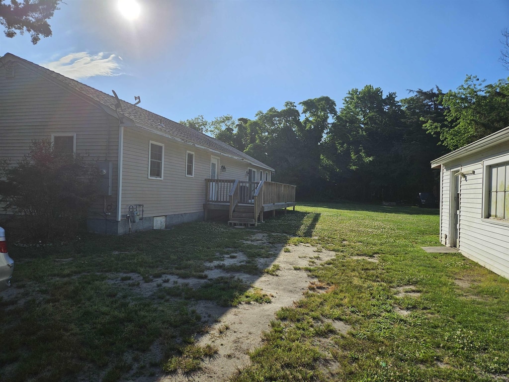 view of yard featuring a deck