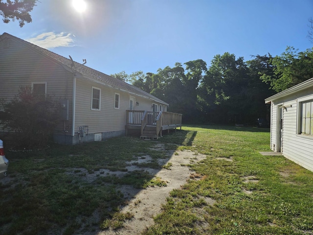 view of yard featuring a deck