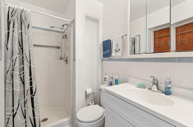 117 W Drumbed Rd, Villas, NJ 08251 - full bath featuring a stall shower, vanity, tile walls, and decorative backsplash