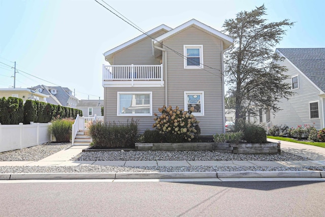 view of property with a balcony