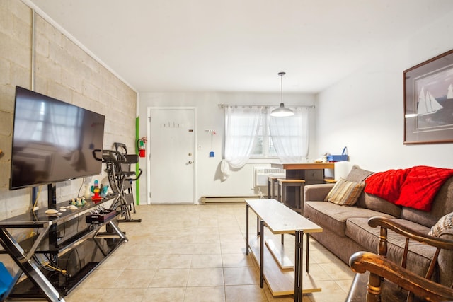 living room featuring an AC wall unit and light tile patterned floors