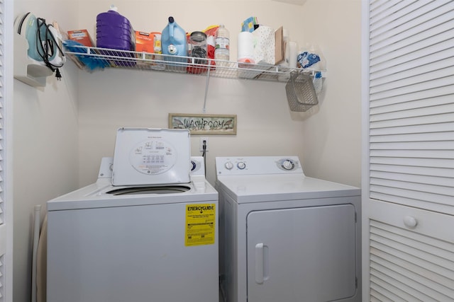 laundry room with washer and dryer