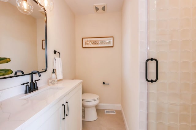 bathroom featuring visible vents, baseboards, toilet, a stall shower, and tile patterned floors