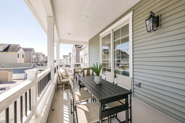 balcony featuring a residential view