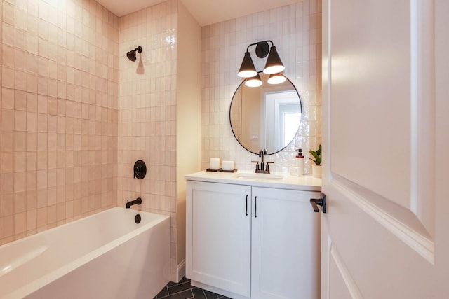 full bathroom featuring vanity,  shower combination, tile walls, and tile patterned flooring