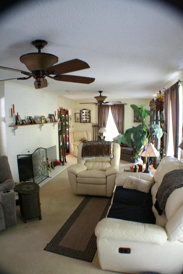 carpeted living room featuring a textured ceiling and ceiling fan