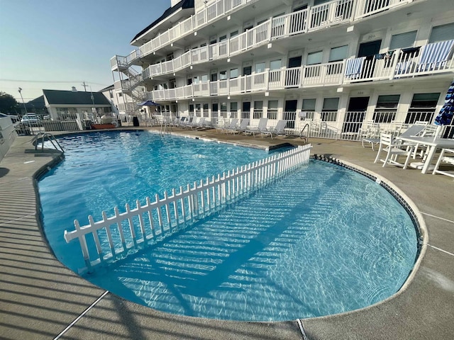 pool featuring a patio area