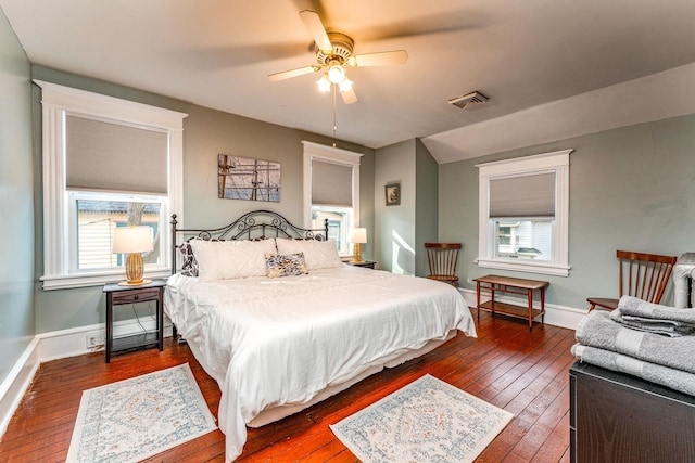 bedroom featuring ceiling fan and dark hardwood / wood-style floors