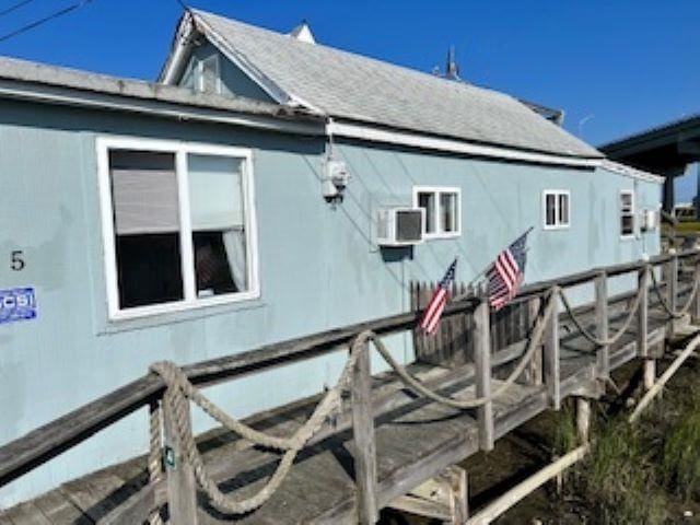 75 W Boardwalk, Grassy Sound, NJ 08260 - view of home's exterior featuring a wooden deck