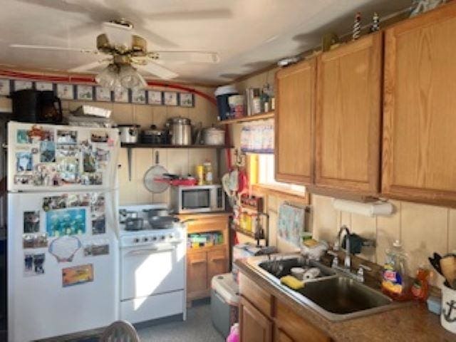 75 W Boardwalk, Grassy Sound, NJ 08260 - kitchen with white appliances and ceiling fan