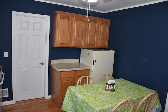7 Corson Ln, Ocean View, NJ 08230 - dining room with wood finished floors, ceiling fan, and baseboards
