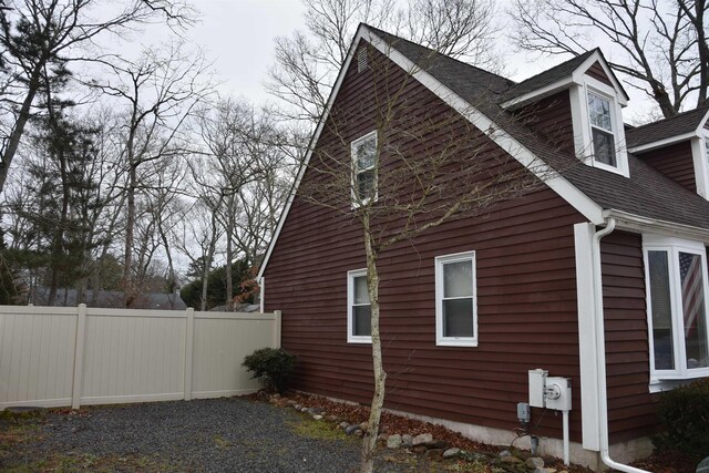 7 Corson Ln, Ocean View, NJ 08230 - view of side of home with a shingled roof