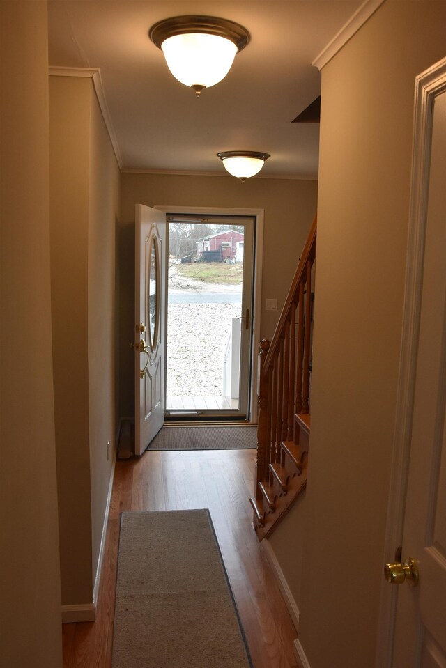 7 Corson Ln, Ocean View, NJ 08230 - entrance foyer with wood finished floors, stairs, ornamental molding, and baseboards