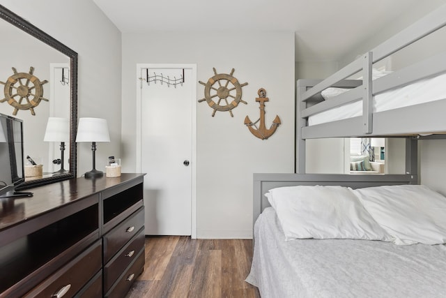 bedroom featuring dark hardwood / wood-style floors