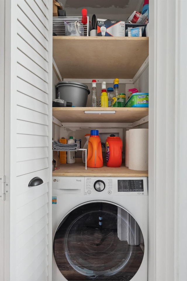 laundry room with washer / dryer