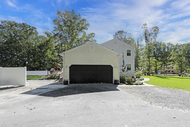 7 Dawn Rd, Petersburg, NJ 08270 - view of home's exterior with driveway, a yard, a garage, and fence